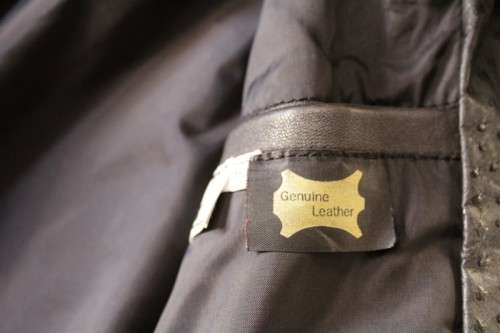 A stunning and very stylish black genuine ostrich skin leather ladies (size medium) bomber jacket