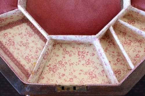An incredible antique (c1890's) Victorian walnut octagonal sewing table w/ an array of compartments