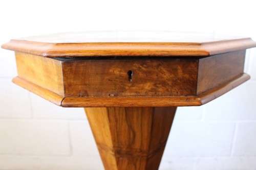An incredible antique (c1890's) Victorian walnut octagonal sewing table w/ an array of compartments