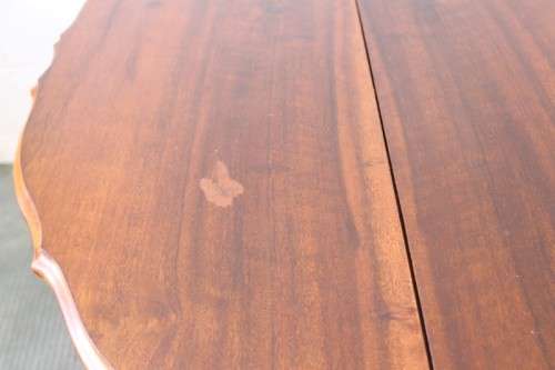 A stunning vintage solid imbuia drop-leaf dining table with beautiful slender Queen Anne legs