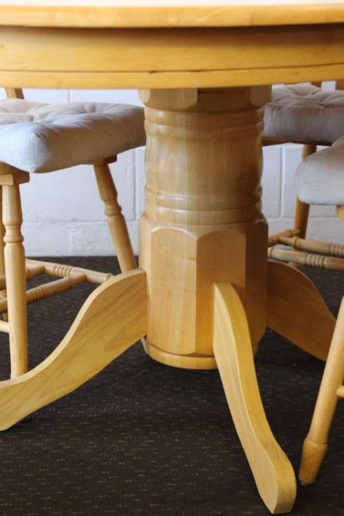 A stunning solid beech wood oval dining table with four gorgeous matching beech wood dining chairs