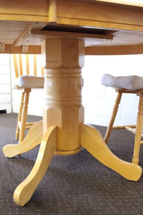 A stunning solid beech wood oval dining table with four gorgeous matching beech wood dining chairs