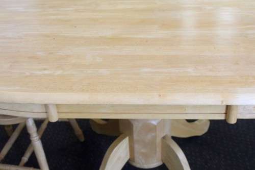A stunning solid beech wood oval dining table with four gorgeous matching beech wood dining chairs