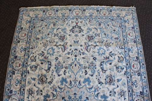 A stunning blue and white Tabriz Persian carpet in light & dark blue, white, cream & touches of red