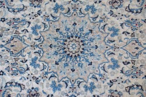A stunning blue and white Tabriz Persian carpet in light & dark blue, white, cream & touches of red