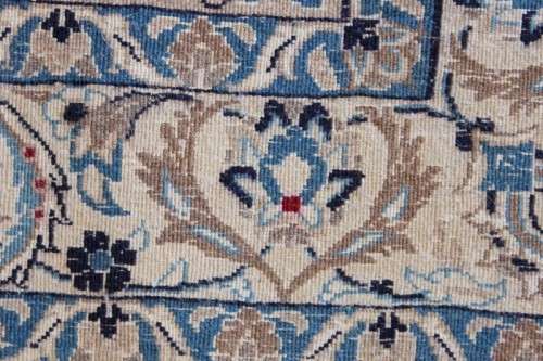 A stunning blue and white Tabriz Persian carpet in light & dark blue, white, cream & touches of red