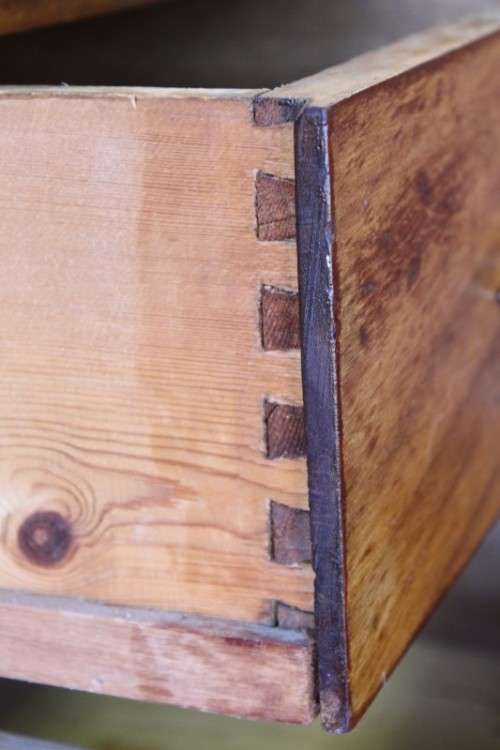 A beautiful vintage 6-drawer solid teak knee-hole partners desk with pull-out writing tops