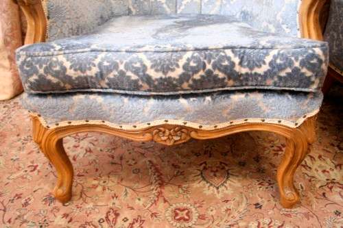 Two elegant hand carved Victorian arm chairs with deep button detailing & gorgeous blue fabric.