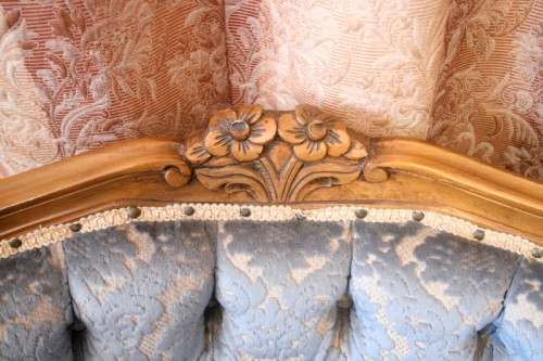 Two elegant hand carved Victorian arm chairs with deep button detailing & gorgeous blue fabric.