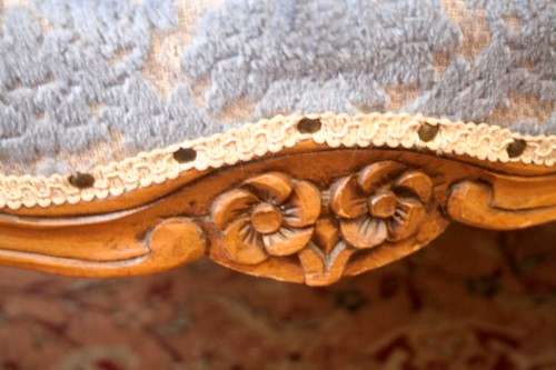 Two elegant hand carved Victorian arm chairs with deep button detailing & gorgeous blue fabric.