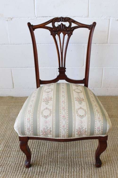 **RS17** A hand-carved antique Victorian slipper/ nursing chair upholstered in a beautiful fabric