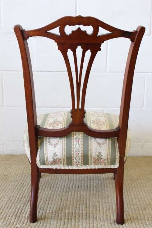 **RS17** A hand-carved antique Victorian slipper/ nursing chair upholstered in a beautiful fabric