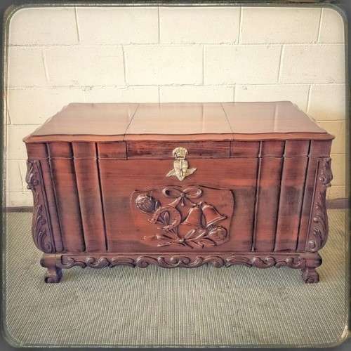 A stunning and beautiful hand carved solid Imbuia ball & claw kist with a 3-way lid & ample space