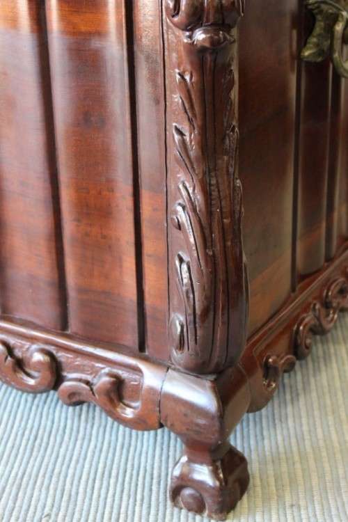 A stunning and beautiful hand carved solid Imbuia ball & claw kist with a 3-way lid & ample space