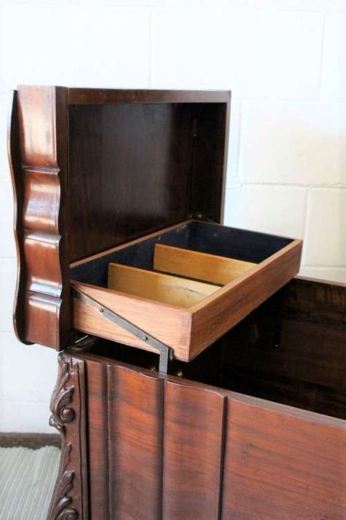 A stunning and beautiful hand carved solid Imbuia ball & claw kist with a 3-way lid & ample space
