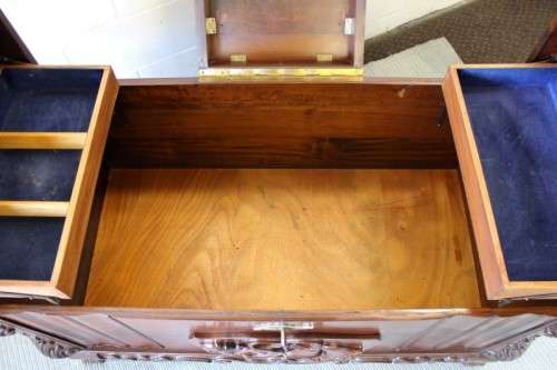 A stunning and beautiful hand carved solid Imbuia ball & claw kist with a 3-way lid & ample space