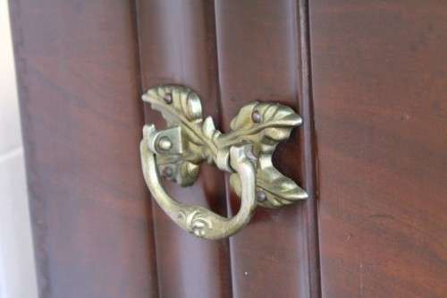 A stunning and beautiful hand carved solid Imbuia ball & claw kist with a 3-way lid & ample space