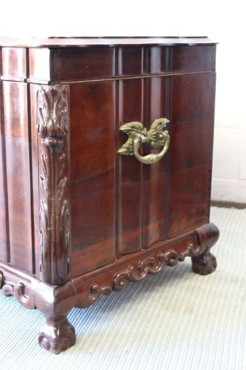 A stunning and beautiful hand carved solid Imbuia ball & claw kist with a 3-way lid & ample space