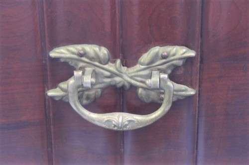 A stunning and beautiful hand carved solid Imbuia ball & claw kist with a 3-way lid & ample space