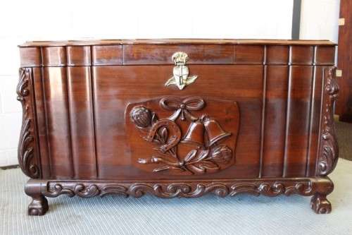 A stunning and beautiful hand carved solid Imbuia ball & claw kist with a 3-way lid & ample space