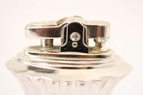 A spectacular vintage (1947) silver plate "Ronson New Port Table Lighter" made in England.
