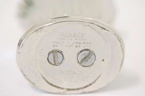 A spectacular vintage (1947) silver plate "Ronson New Port Table Lighter" made in England.