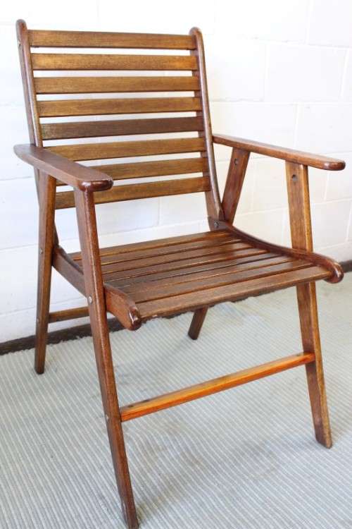 A fabulous 6-seater solid Sapele wood, all weather "Outback" outdoor patio table with 6 armchairs