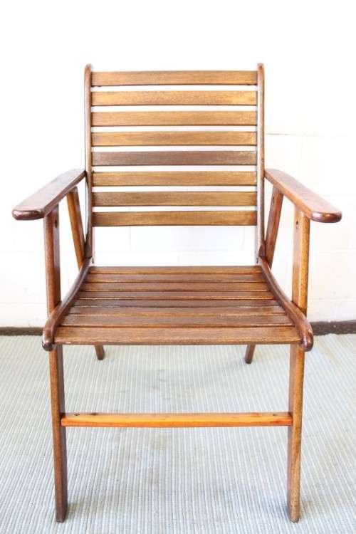 A fabulous 6-seater solid Sapele wood, all weather "Outback" outdoor patio table with 6 armchairs