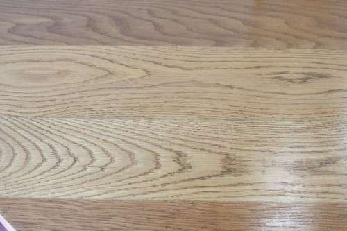A wonderful solid Oak dining suite with a large round table and 5x upholstered chairs