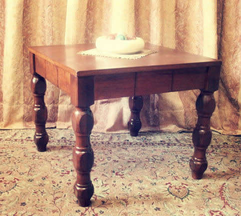 A wonderful Teak coffee/ occasional table with turned legs - very well made and stylish!