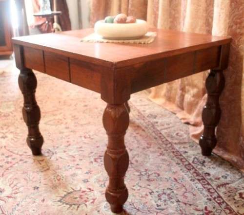 A wonderful Teak coffee/ occasional table with turned legs - very well made and stylish!