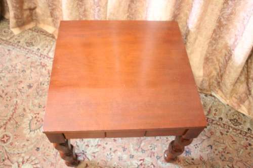A wonderful Teak coffee/ occasional table with turned legs - very well made and stylish!