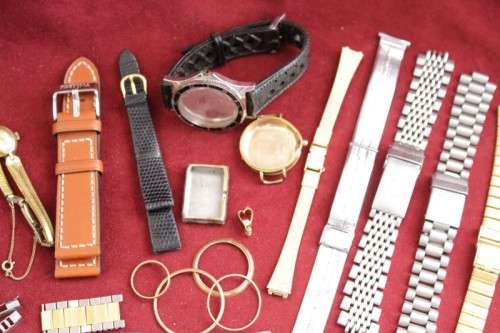 An incredible collection of assorted watchmaker spares including straps, links, bezels and more
