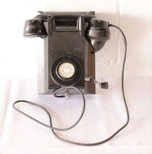 An exceptionally rare antique c1940 "Ericsson" black Bakelite hand-cranked wall exchange telephone