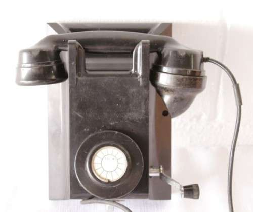 An exceptionally rare antique c1940 "Ericsson" black Bakelite hand-cranked wall exchange telephone