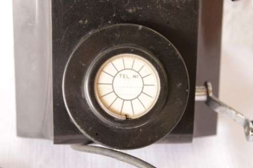 An exceptionally rare antique c1940 "Ericsson" black Bakelite hand-cranked wall exchange telephone