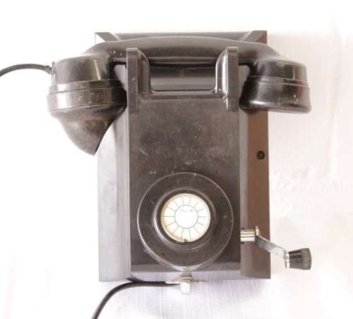 An exceptionally rare antique c1940 "Ericsson" black Bakelite hand-cranked wall exchange telephone
