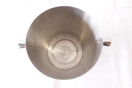 A stunning double-handle stainless steel wine cooler/ ice bucket with a lovely etched pattern