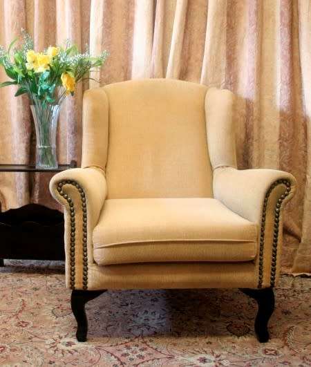 A fabulous wing back chair in great condition for the age! Perfect for a study or reading room