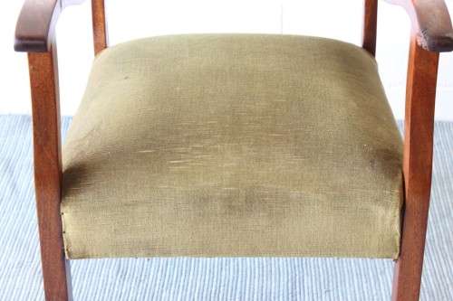 A lovely vintage solid teak lounge armchair with green upholstery - great extra seat in the house!
