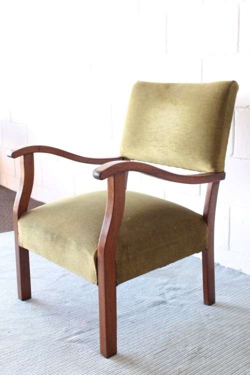 A lovely vintage solid teak lounge armchair with green upholstery - great extra seat in the house!