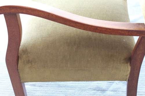 A lovely vintage solid teak lounge armchair with green upholstery - great extra seat in the house!