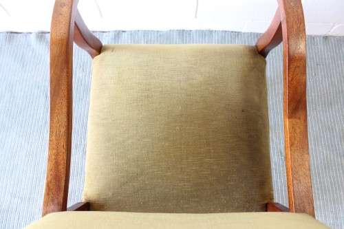 A lovely vintage solid teak lounge armchair with green upholstery - great extra seat in the house!