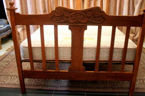 A stunning vintage solid carved Oak double bed headboard & footboard with an Edblo mattress set.
