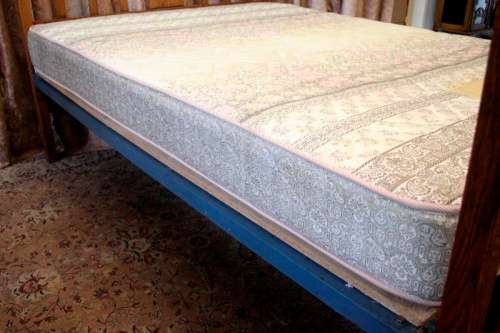 A stunning vintage solid carved Oak double bed headboard & footboard with an Edblo mattress set.