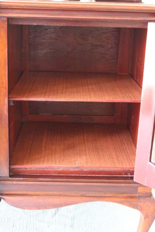 An exquisite LARGE vintage side server with pad foot legs and stunning carved wooden rosettes!