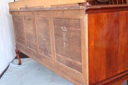 An exquisite LARGE vintage side server with pad foot legs and stunning carved wooden rosettes!