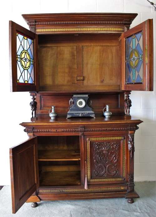 A spectacular antique (1800s) heavily carved Tiger Oak "Mechelen Style" buffet w stained glass - WOW