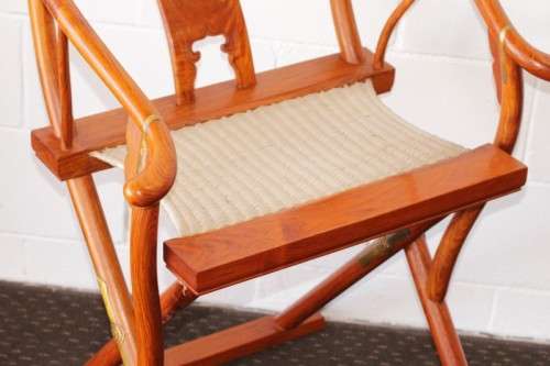 Incredible & beautifully well made oriental rosewood Japanese horseshoe armchair w/ brass detailing