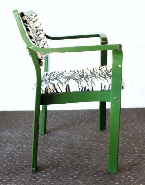 **RS17** A green painted yellow wood armchair with animal print & matching mid-century footrest
